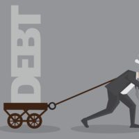 Man pulling a wagon of debt.jpg.crdownload