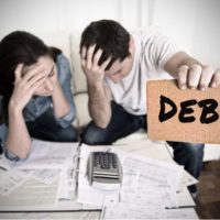 couple struggling with debt