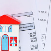 Image of condos with bills - show condo fees are dischargeable Image of condos with bills - show condo fees are dischargeable