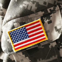 military service member's jacket with US flag patch military service member's jacket with US flag patch