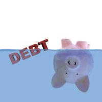 Piggy bank submerged under water to indicate discharge of debt Piggy bank submerged under water to indicate discharge of debt