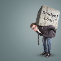 Businessman carrying a large and heavy stone on his back Businessman carrying a large and heavy stone on his back