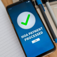 Notification of successful HOA payment. Concept of paying Home Owners Association fees for your neighborhood.