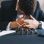 Depressed businessman lost his business. Destroyed businessman. Concept of business loss, bankruptcy and crisis.