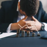 Depressed businessman lost his business. Destroyed businessman. Concept of business loss, bankruptcy and crisis.