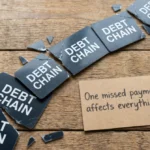 broken-debt-chain-symbolizing-financial-stress